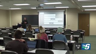 NMU students learn financial tips in interactive game