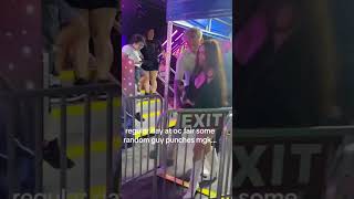Megan Fox gets slammed into barricade as man tries to punch Machine Gun Kelly at fair #shorts