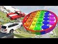 High speed jump into giant pop it toy crash test  beamng drive cars jump into giant pop it toy