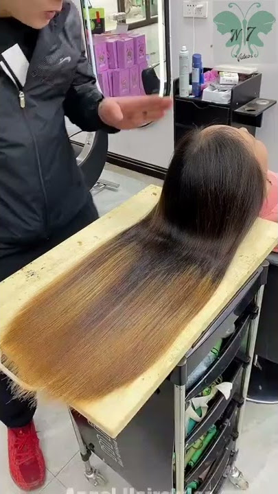 super long hair cut off on chopping board