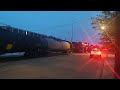 A GP38-2 locomotive, a SD60I and "Chuck" are hauling an OC manifest train.