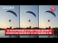 VIRAL: Power Line Strike Sends Paraglider CRASHING Into Red River | Wild Crash CAUGHT on VIDEO