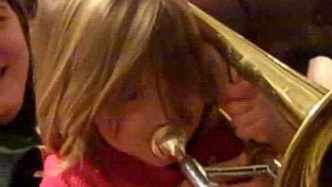 Ruby Larson playing the trombone at 3 years old