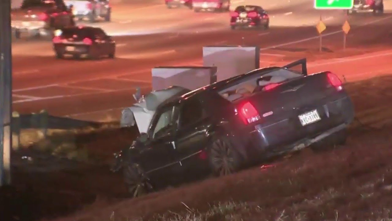Driver hospitalized after plowing through traffic signs, crashing into ...