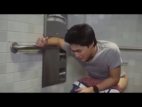 Man taking a shit on a dirty  toilet