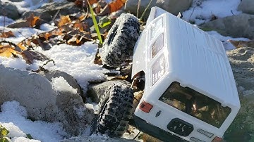 Axial Scx24 Wrangler Rock Crawling in snow!