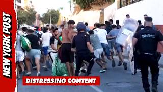 Migrant Mob Chanting 'Allahu Akbar' CLASH With Police, Days After 60K Stormed Spanish Territory