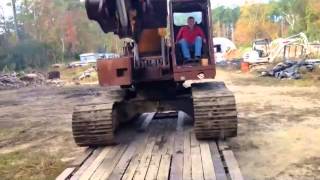 Loading the Case 160CK Excavator