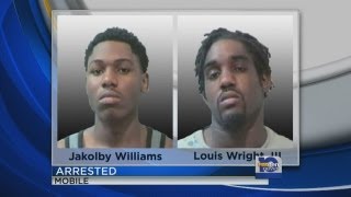 Two men arrested after home invasion