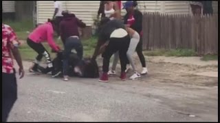 Mob Repeatedly Kicks and Stomps Woman in Sadistic form of Entertainment on FB