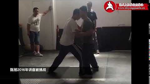 Chen Xu dealing with challenger at a workshop in 2016.