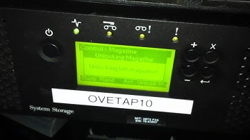 How to open left magazine on IBM ts3100