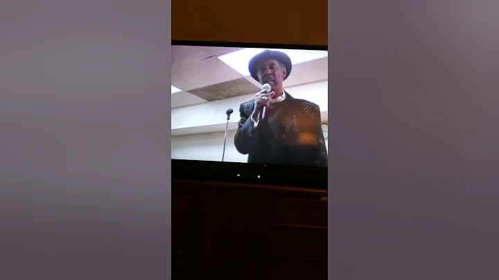 Eugene Ross singing"Hold on a change is coming!"