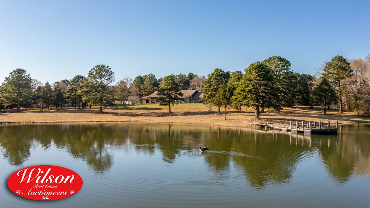 PRAIRIE WOLF FARMS HOME & LAND ABSOLUTE AUCTION