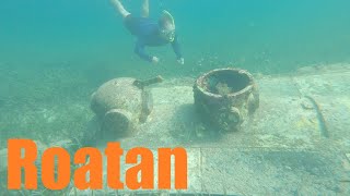 We found a submarine while snorkeling in Roatán, Honduras!