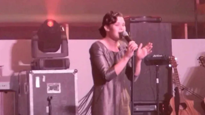 Whitley Walker singing during offering at Music Fe...