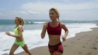 Two Women Jogging along the Beach