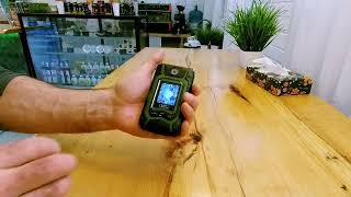 Review of a Land Rover X9 Flip rare smartphone in a store in Russia