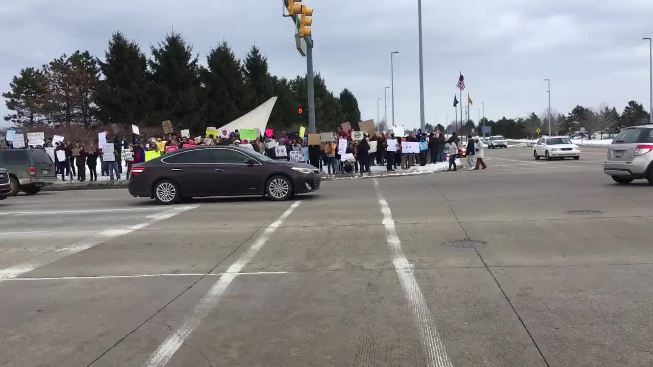 Travel ban protesters outside Ford Airport