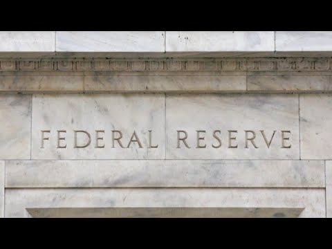 Federal Reserve cuts interest rates by a quarter point - YouTube