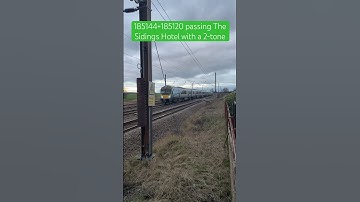 TPE Class 185s passing The Sidings Hotel
