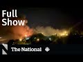 CBC News: The National | Evin prison fire, Mafia investigation, Laurent Duvernay-Tardif