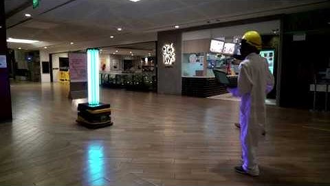Robot blasts UV light to fight virus in mall