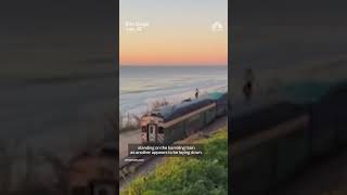 Teens arrested after video of them 'train surfing' goes viral