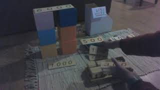 Subtraction using Base 10 Blocks-- it shows how to borrow (2nd & 3rd grade)