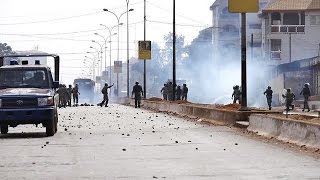 Anti-government protesters in Guinea clash with police