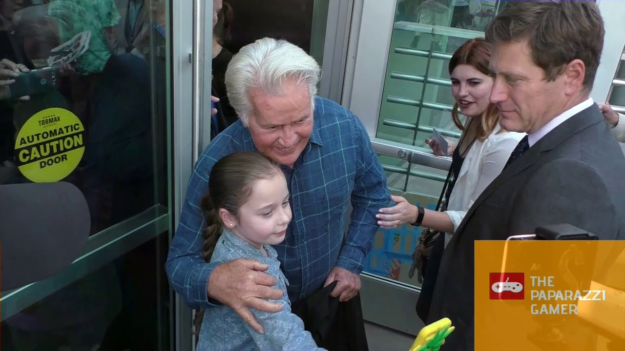 Martin Sheen greets a young fan outside the premiere of Apocalypse Now Final Cut at ArcLight