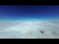 FPV Flight: Above the Clouds and Back Through a Portal in the Sky!