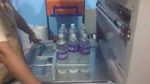 web sealer with shrink tunnel machine - Amar Packaging brand