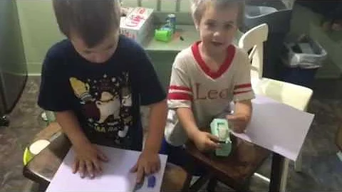 Gus&Leo Making Fingerprints