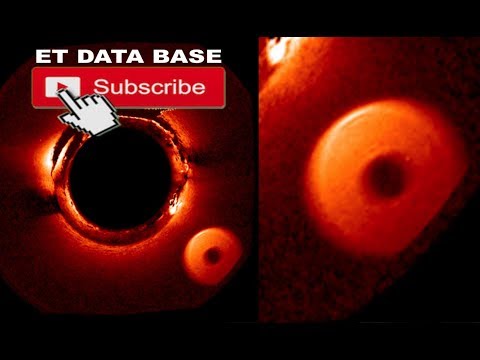 UFO Passes In front Of Sun and SOHO/NASA satellite! UFO Sighting News.