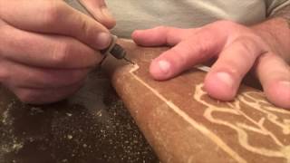 Using a Dremel 100 to carve wood. I