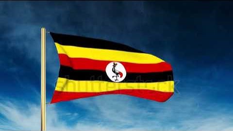Uganda flag slider style. Waving in the wind with cloud background animation Stock video by