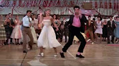 Why is Grease such a bad movie?