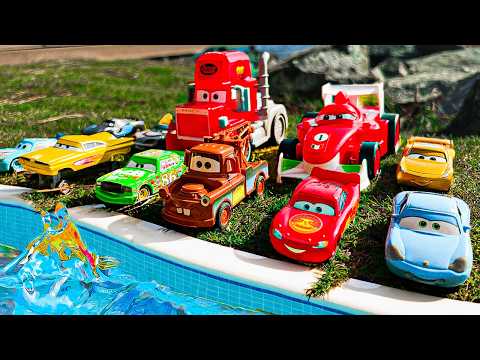 Disney Pixar Cars falling into deep pool, Lightning McQueen, Tow Mater, Mack, Sally, Francesco