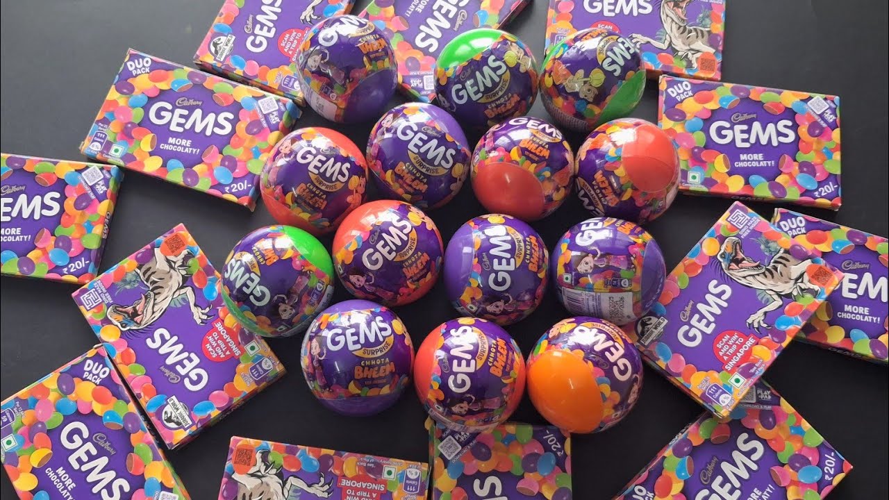 100 candies opening, chocolate a video, lots of chocolates, Cadbury celebration, surprise toys