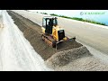 Nice activities cat dozer spreading gravel building foundation roads  bulldozer pushing gravel