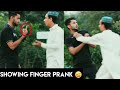 Showing finger prank  shararti larka