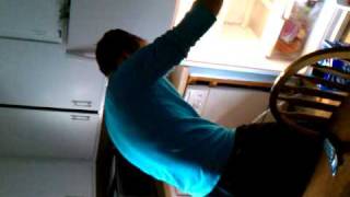 Travis pisses on Fridge