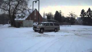 Drifting in the snow with my GMC Yukon...