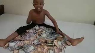 FRESH KID SITTING ON MONEY
