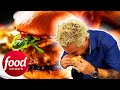 Guy fieri takes on the spicy peanut butter crunch burger in california  diners driveins  dives