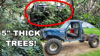Big Block F350 On 40s plows through dense forest swamp