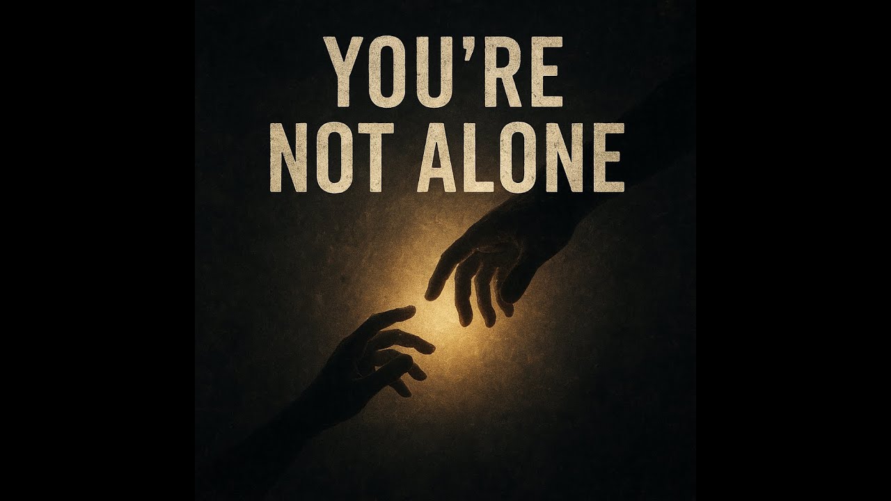 Assista a You're Not Alone (Official Lyric Video) no YouTube Assista a You're Not Alone (Official Lyric Video) no YouTube