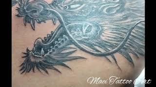 Tatto kepala naga