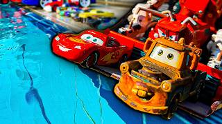 Disney Pixar Cars falling into deep pool, Lightning McQueen, Tow Mater, Mack, Sally, Francesco